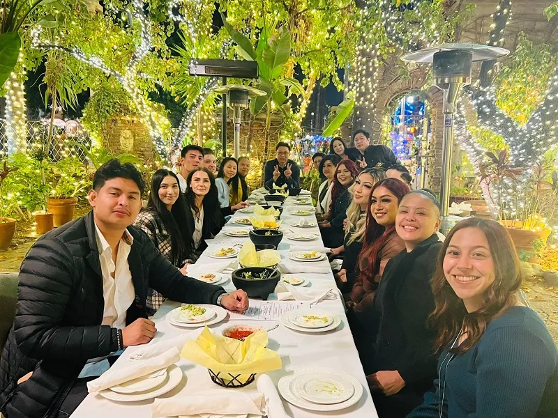 Group photo at Christmas Dinner Party of the office staff